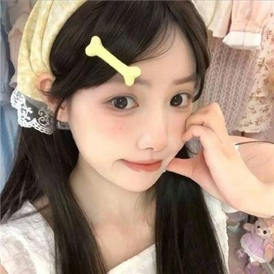 桃花含露又春风